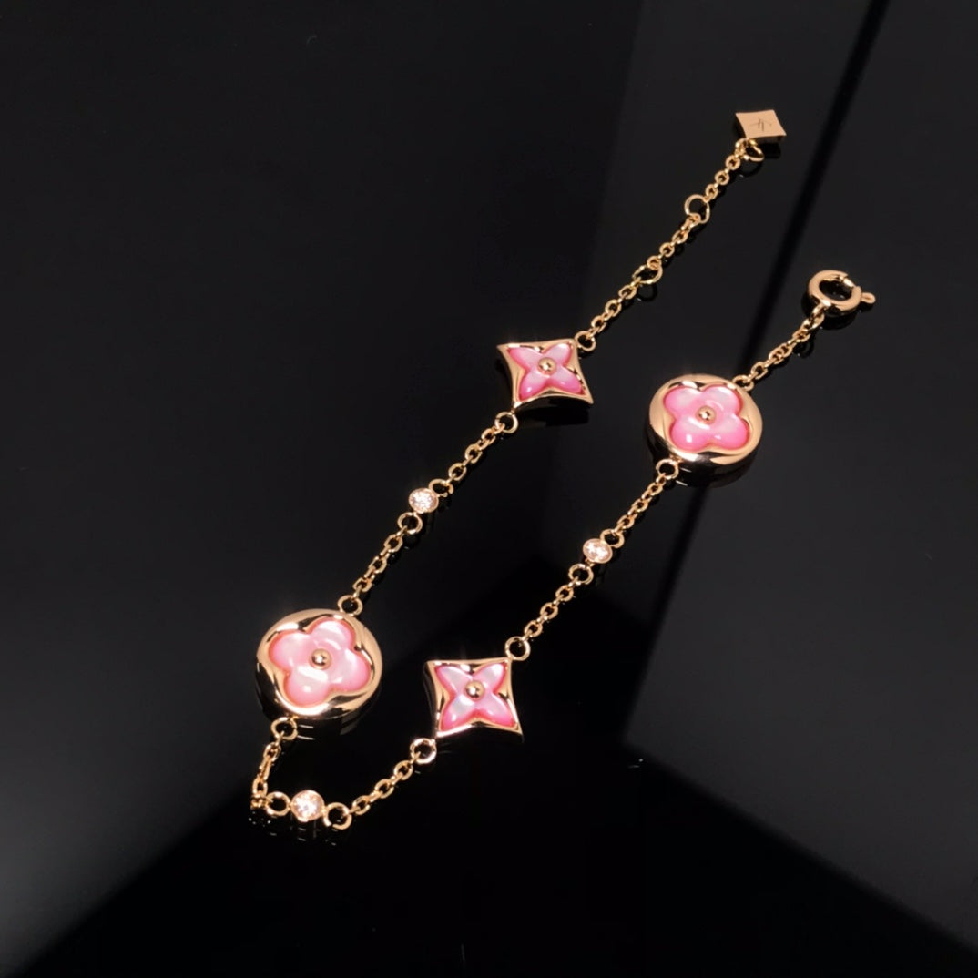 {
  "[⭐DORISW] STAR AND SUN 4 MOTIF PINK MOP PINK GOLD BRACELET": "[⭐DORISW] スター＆サン 4モチーフ ピンクMOP ピンクゴールド ブレスレット"
}