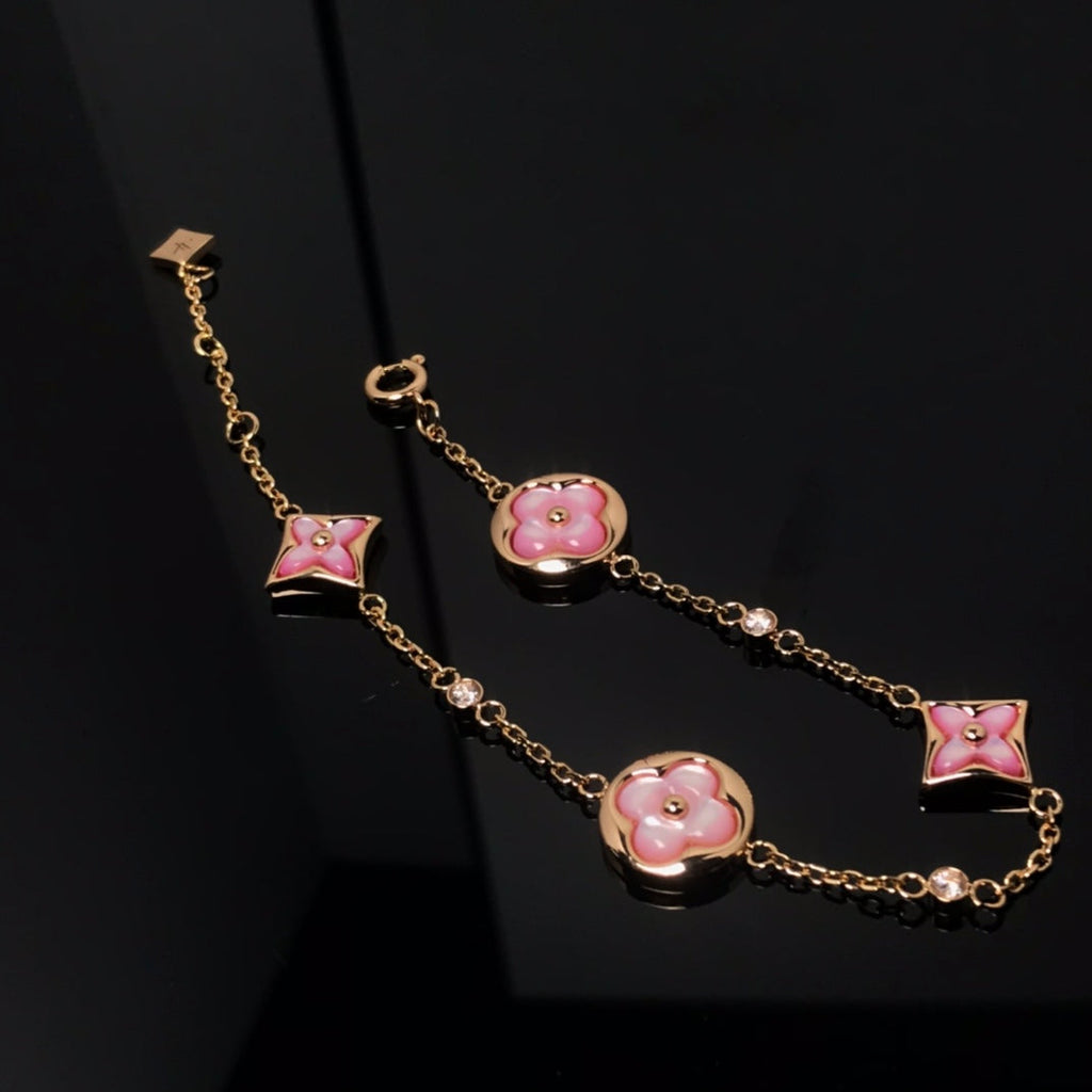 {
  "[⭐DORISW] STAR AND SUN 4 MOTIF PINK MOP PINK GOLD BRACELET": "[⭐DORISW] スター＆サン 4モチーフ ピンクMOP ピンクゴールド ブレスレット"
}