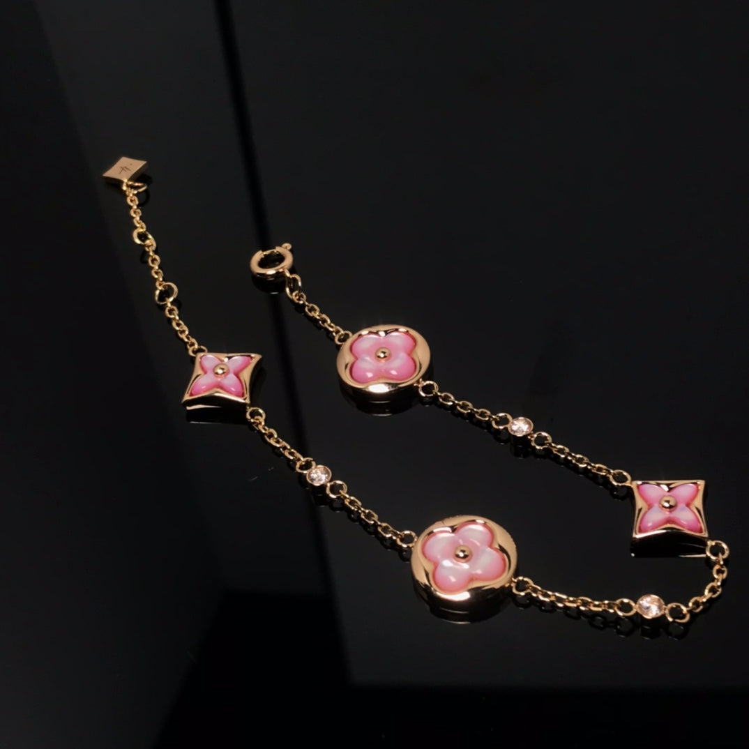 {
  "[⭐DORISW] STAR AND SUN 4 MOTIF PINK MOP PINK GOLD BRACELET": "[⭐DORISW] スター＆サン 4モチーフ ピンクMOP ピンクゴールド ブレスレット"
}