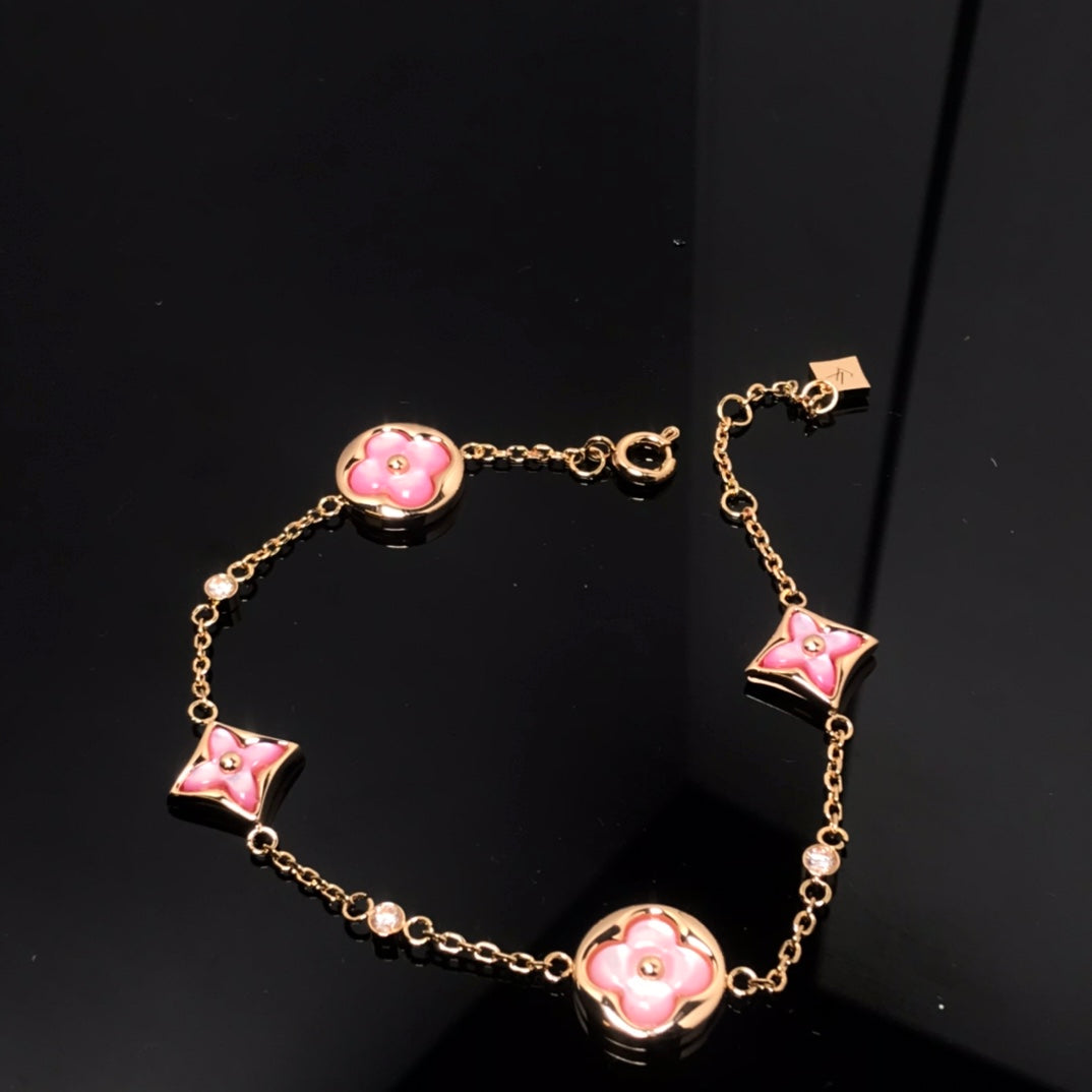 {
  "[⭐DORISW] STAR AND SUN 4 MOTIF PINK MOP PINK GOLD BRACELET": "[⭐DORISW] スター＆サン 4モチーフ ピンクMOP ピンクゴールド ブレスレット"
}