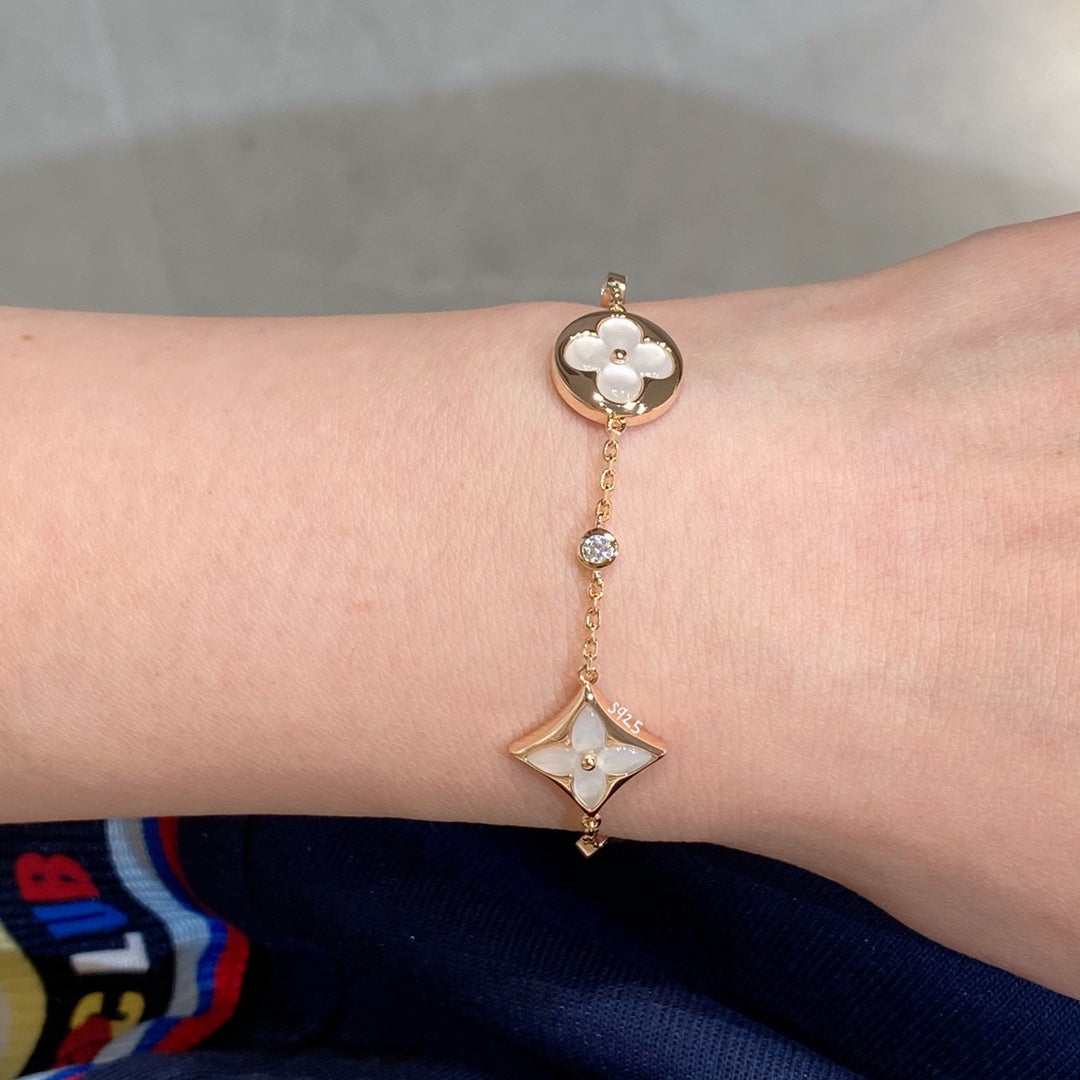 [⭐DORISW] ARMBAND MIT STERN- UND SONNENMOTIV, WEISSES PERLMUTT, ROSÉGOLD